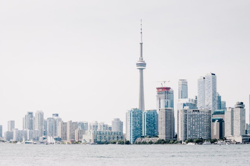 Toronto skyline seen from Lake Ontario on clear day to show favourable buying conditions in August 2025.