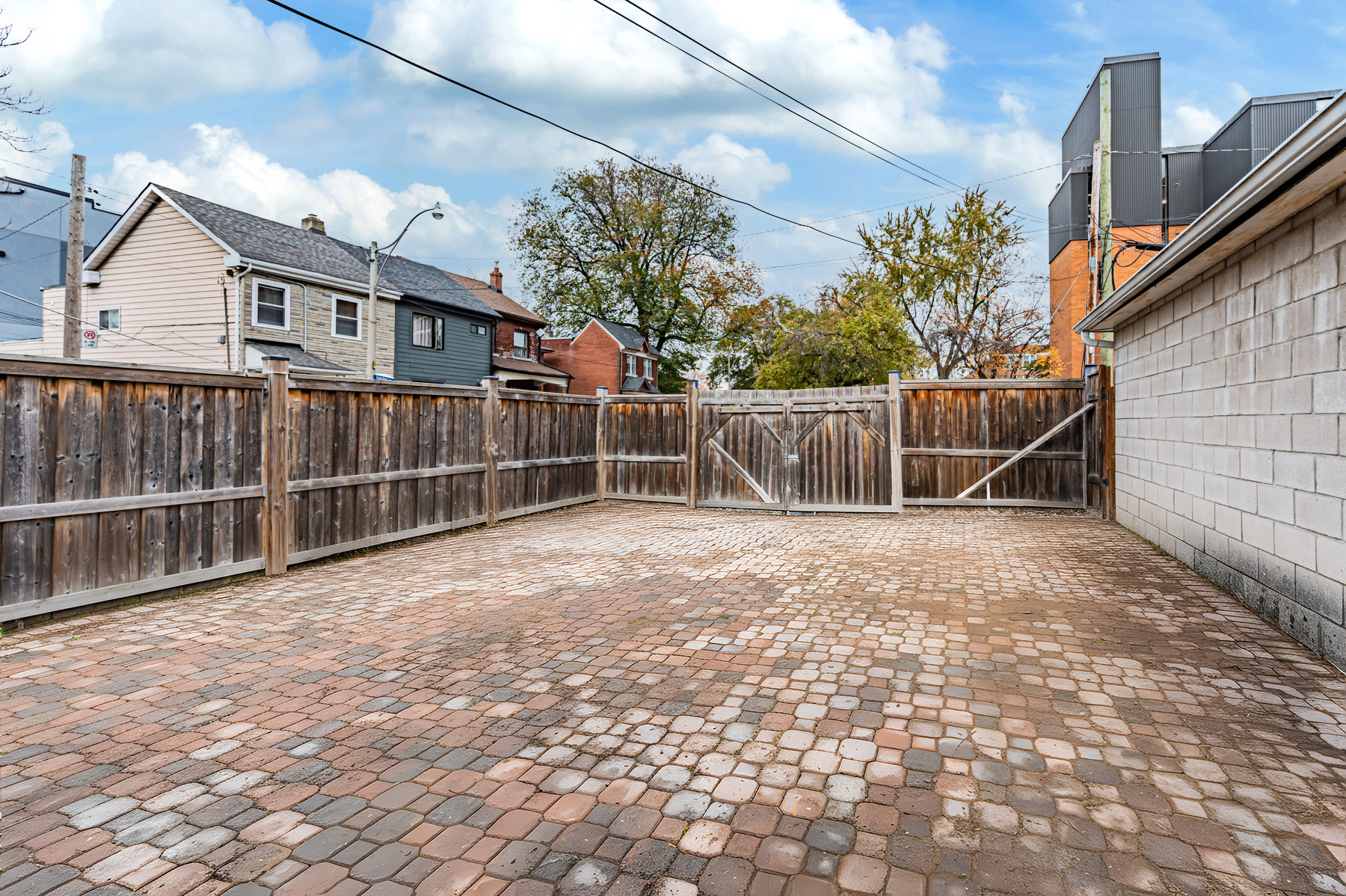 42 Carr St backyard with wooden fence and gate.