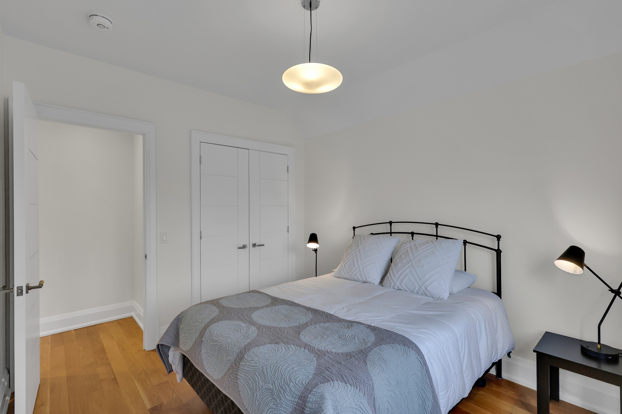 House bedroom with double-door closet. 