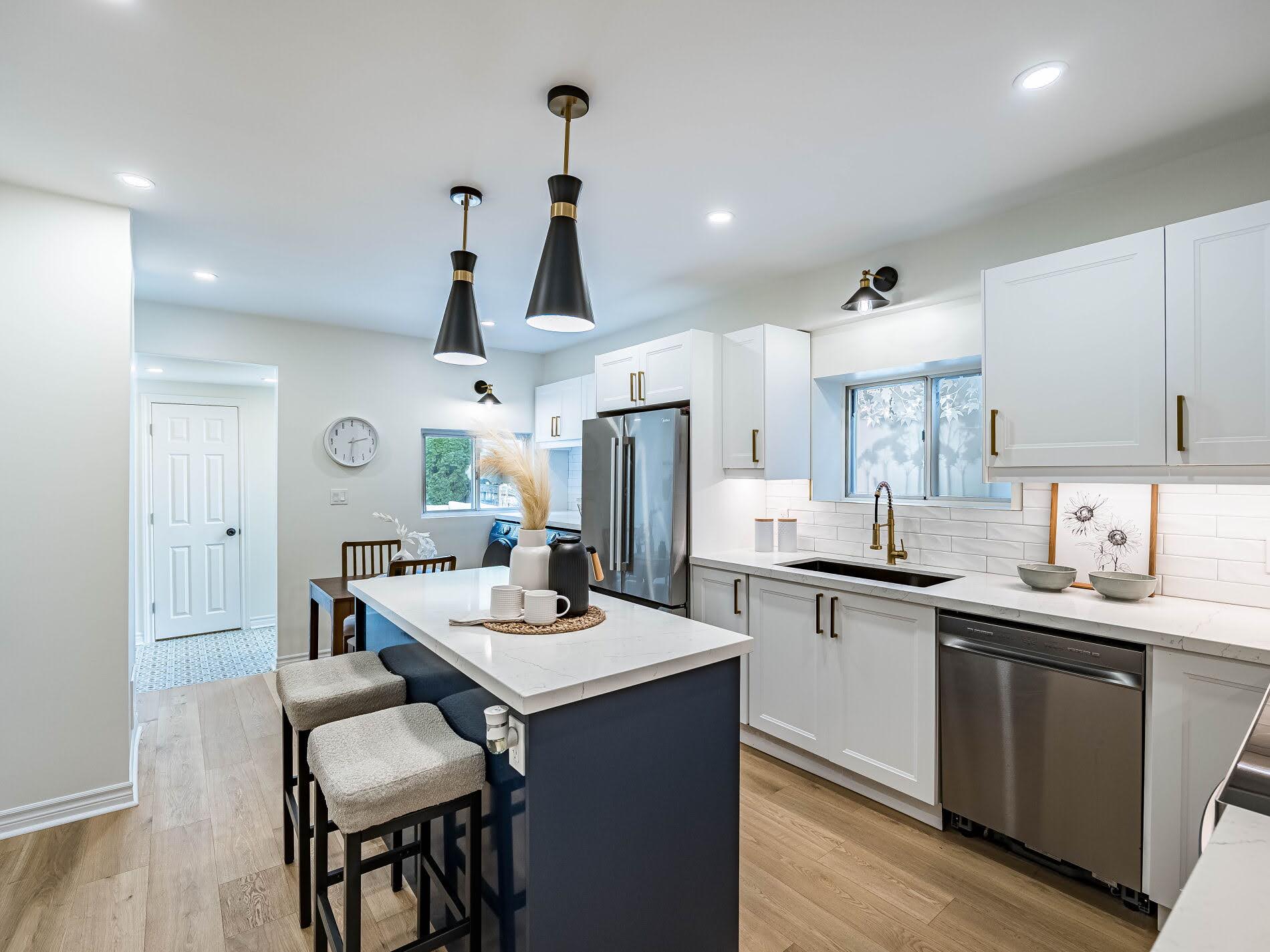 Kitchen island with built-in outlet.