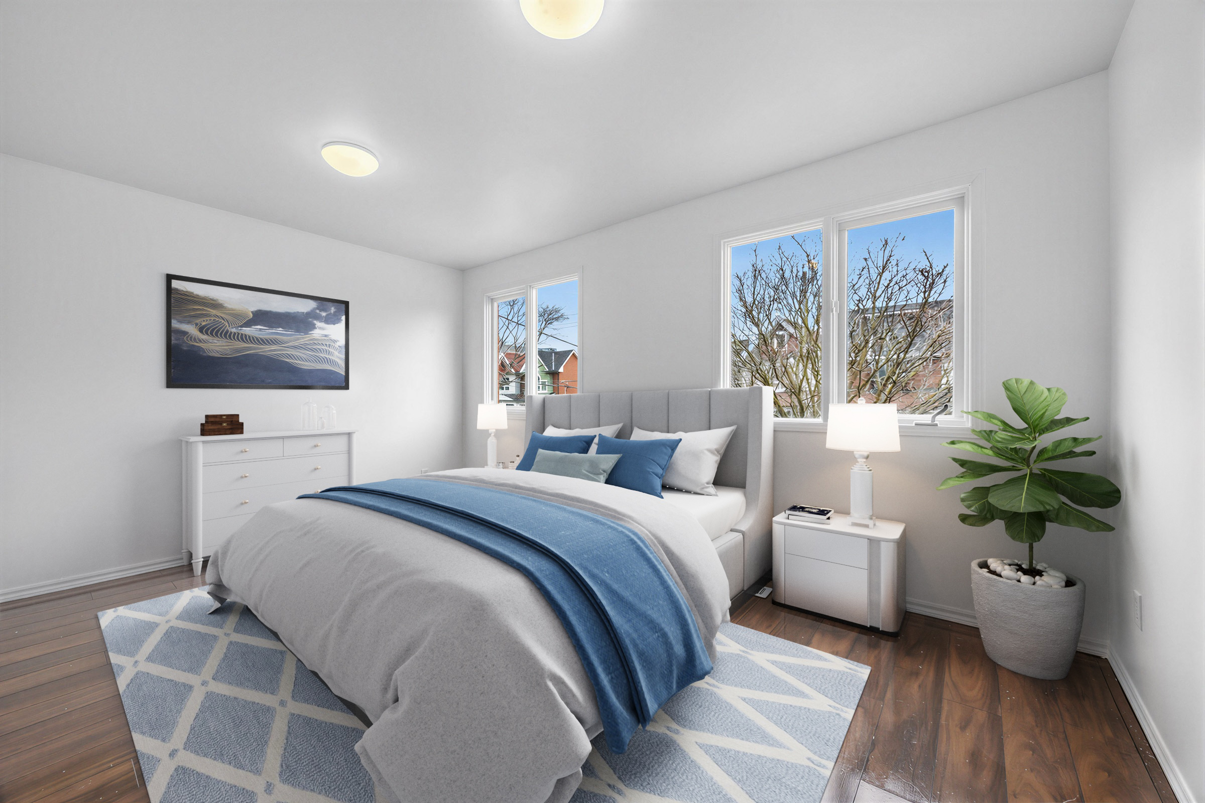 57 Shanly St large 2nd floor bedroom with contemporary bed and furniture, two windows overlooking street, and two ceiling lamps.