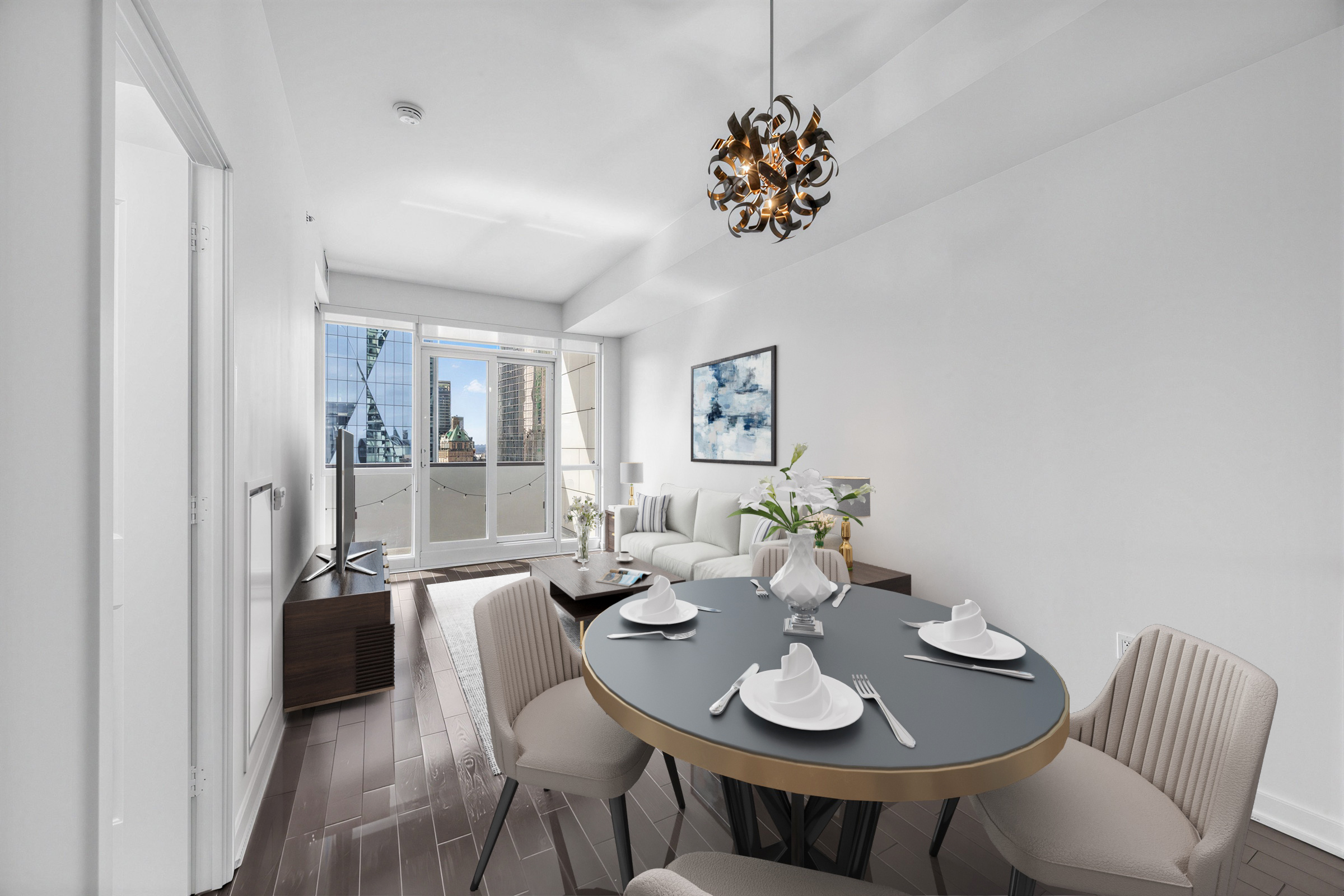 1 The Esplanade Unit 3403 dining room with table, chairs and sculpted metal light fixture in shape of sphere. 