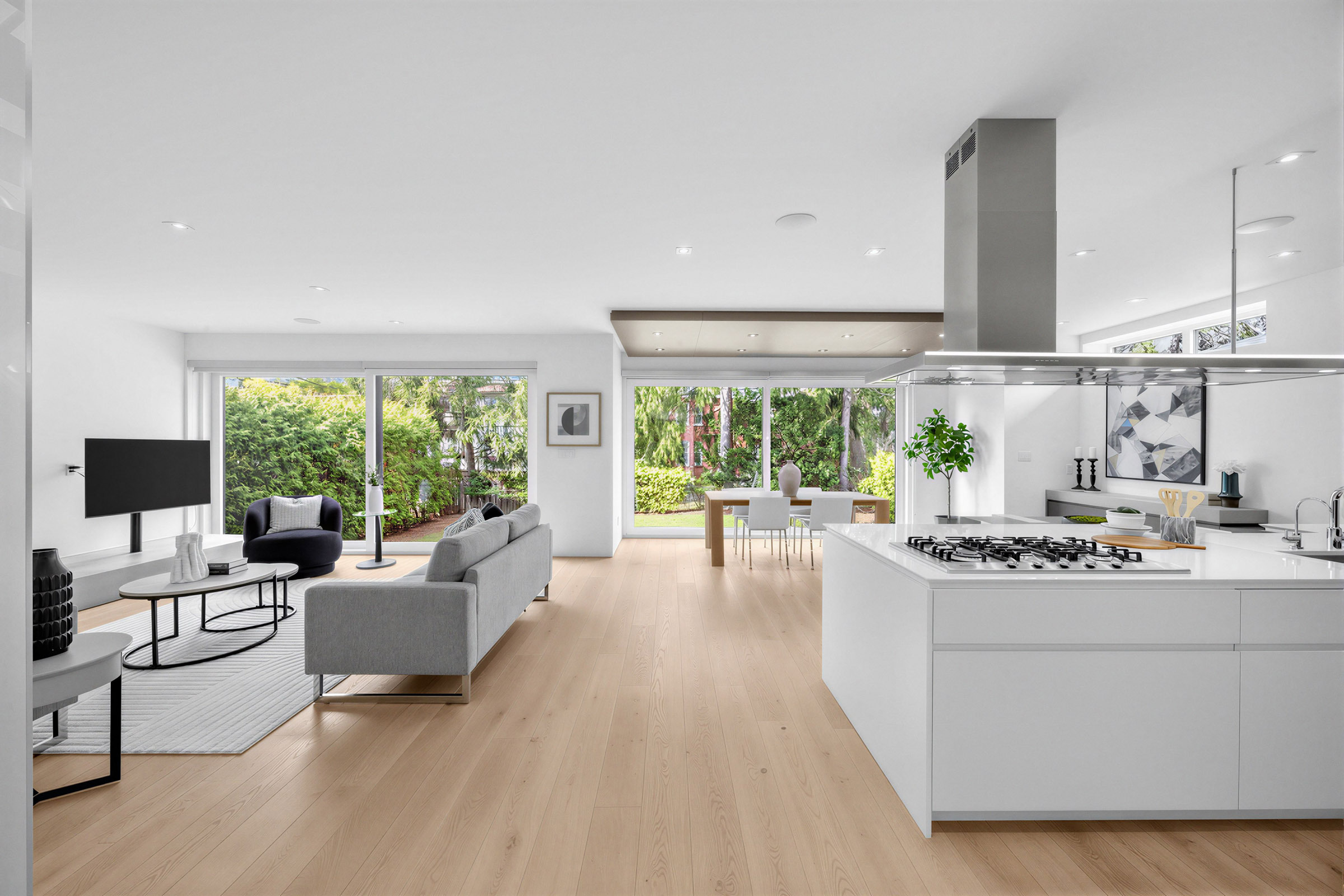 House with spacious, elegant living, dining and kitchen areas.