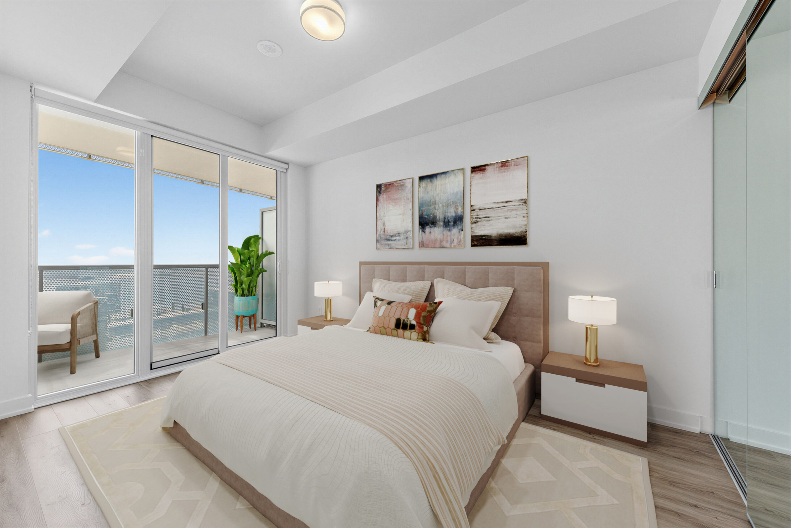 15 Queens Quay E Unit 1901 spacious primary bedroom with 3D rendered furniture and balcony with Toronto waterfront view.