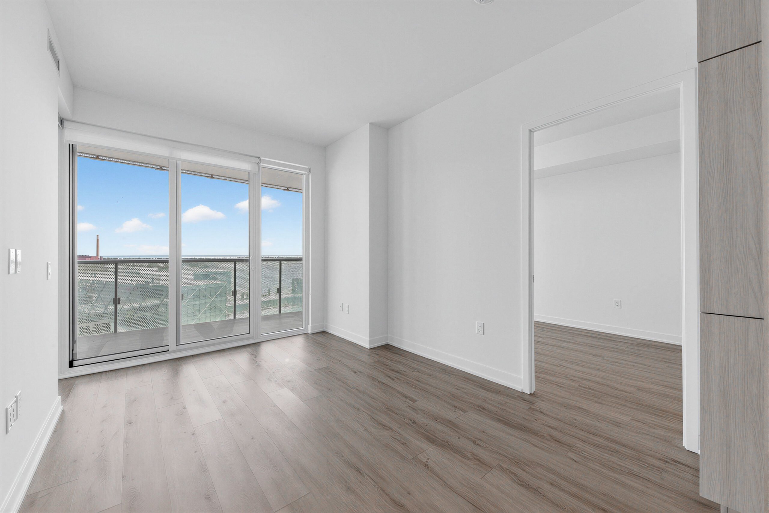 Balcony doors showing view of Toronto waterfront – 15 Queens Quay E Unit 1901.